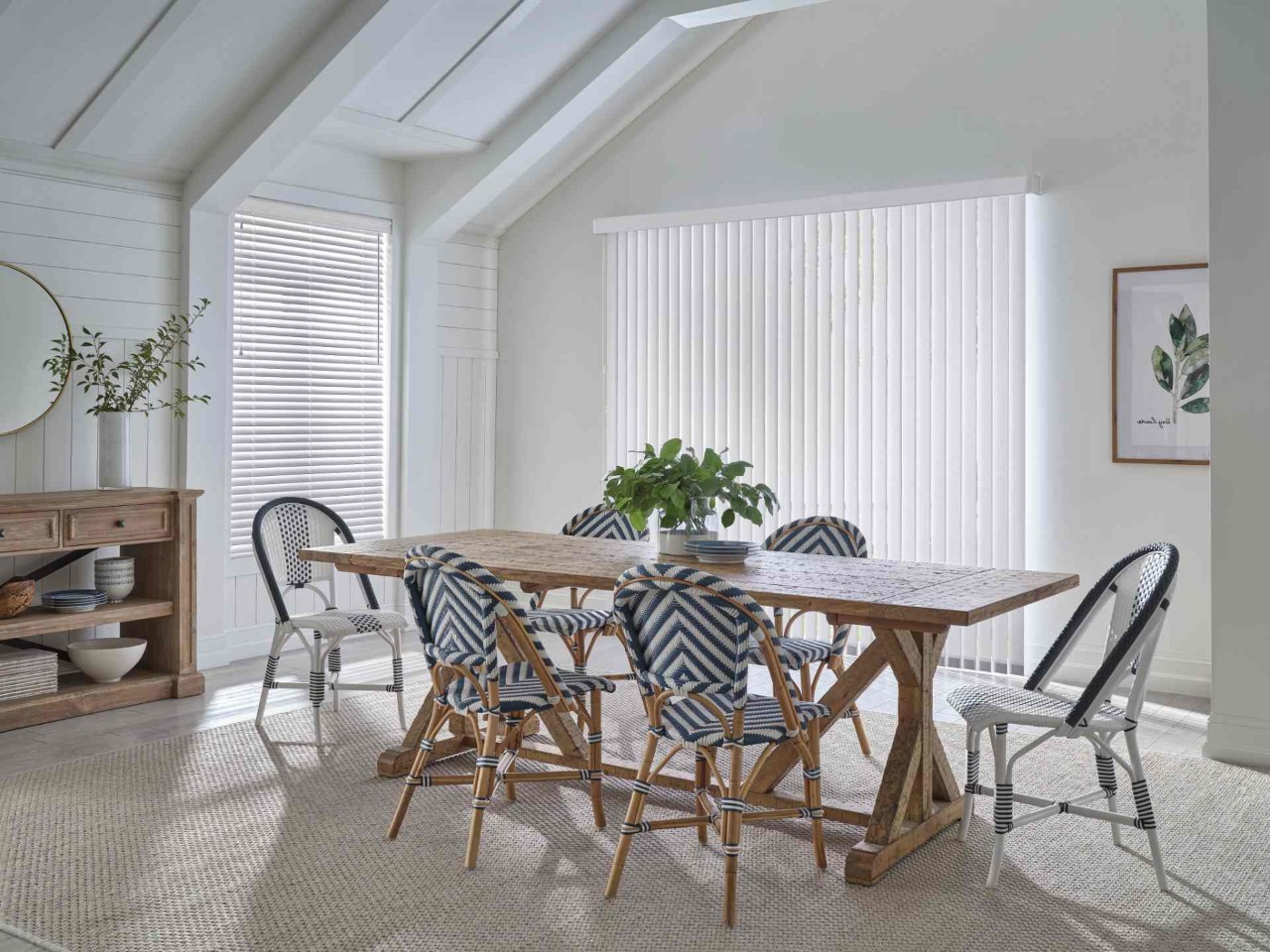 Vertical large window blinds covering a large window in a dining room. near Anaheim, CA